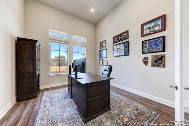 office space featuring dark wood-type flooring