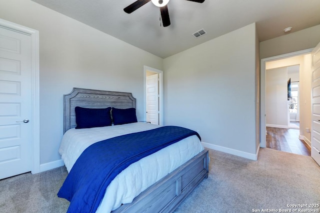 carpeted bedroom featuring ceiling fan