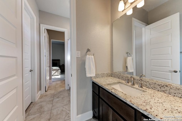 bathroom with vanity and tile patterned floors