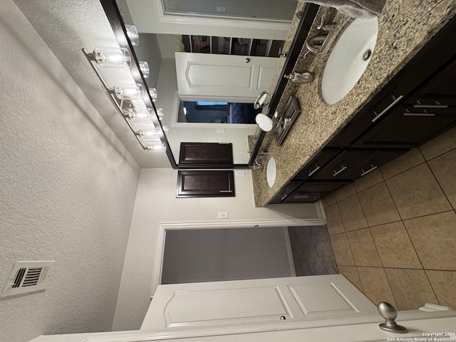 bathroom featuring tile patterned floors