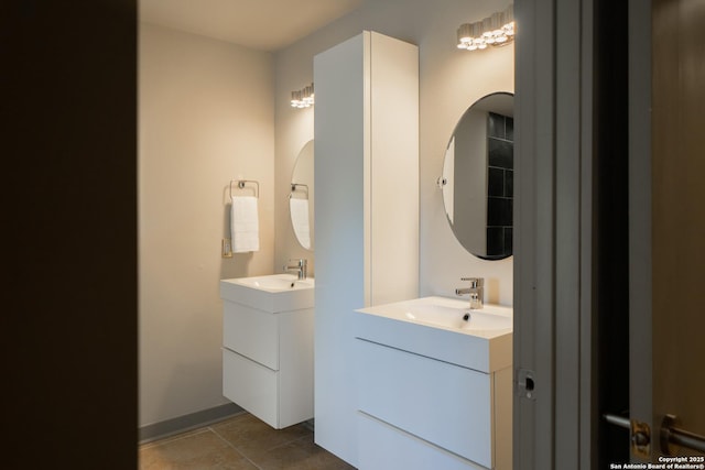 bathroom featuring tile patterned floors and vanity