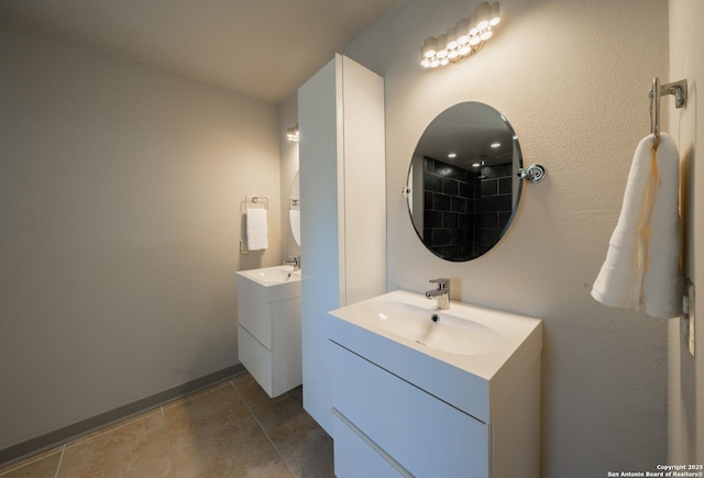 bathroom featuring vanity and tile patterned flooring