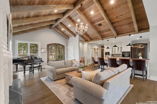 living room with beam ceiling, high vaulted ceiling, dark hardwood / wood-style floors, wooden ceiling, and a chandelier