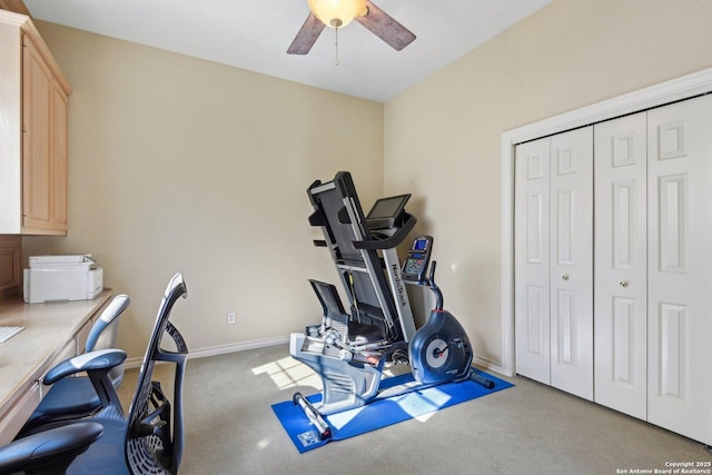 workout room featuring carpet flooring and ceiling fan