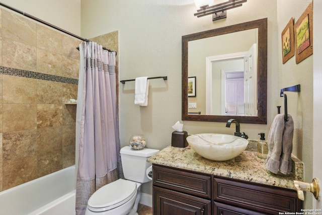 full bathroom featuring vanity, shower / bath combination with curtain, and toilet