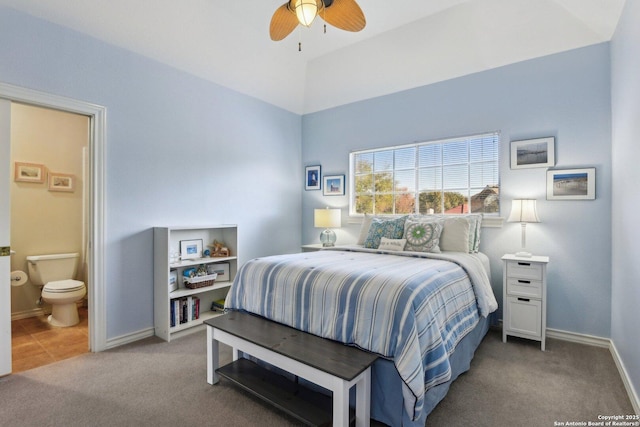 carpeted bedroom featuring ensuite bathroom and ceiling fan