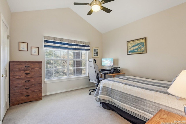 carpeted bedroom featuring lofted ceiling and ceiling fan