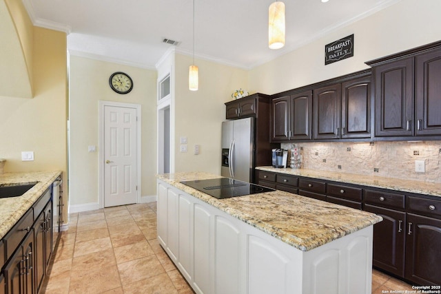 kitchen with pendant lighting, tasteful backsplash, dark brown cabinetry, black electric cooktop, and stainless steel fridge with ice dispenser