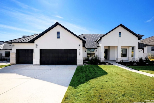 modern farmhouse with a garage and a front lawn