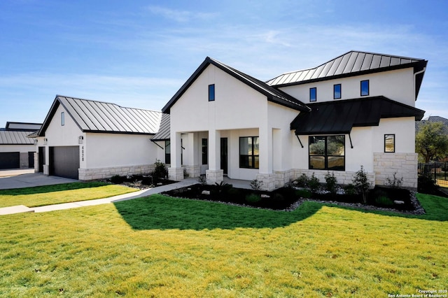 modern farmhouse with a garage and a front yard