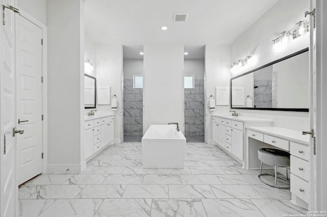 bathroom featuring plus walk in shower and vanity