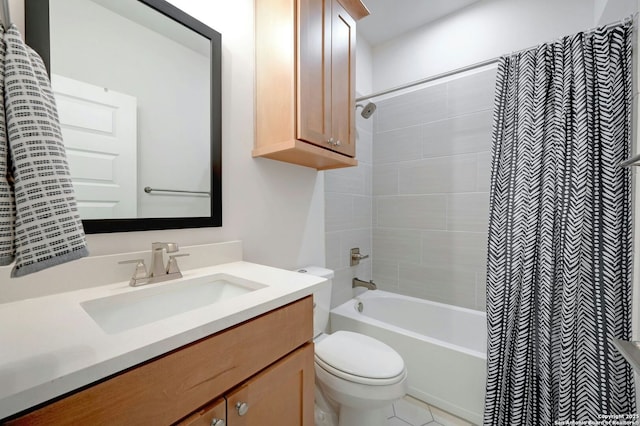 full bathroom featuring vanity, shower / tub combo, and toilet