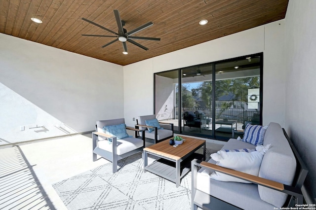 view of patio / terrace featuring a balcony, outdoor lounge area, and ceiling fan