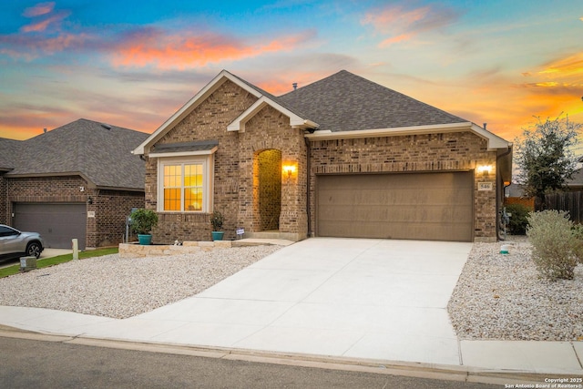 view of front of property featuring a garage