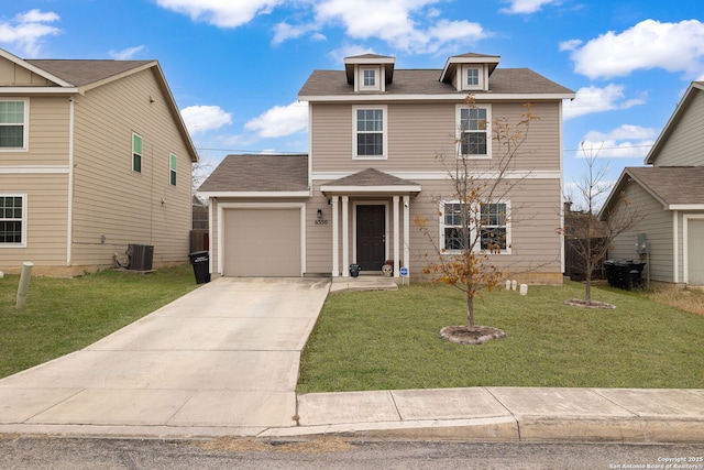 front facade with a garage, central AC unit, and a front yard