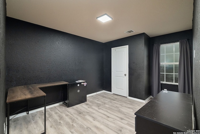 home office featuring light hardwood / wood-style flooring