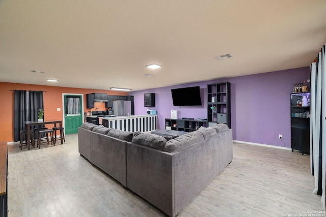 living room featuring light wood-type flooring