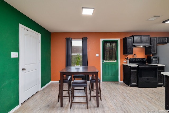 dining room featuring light hardwood / wood-style floors