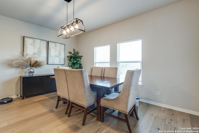 dining space featuring light hardwood / wood-style floors