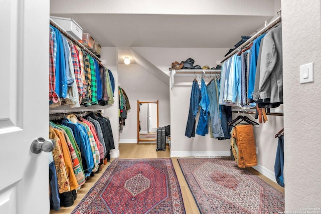 walk in closet featuring light wood-type flooring