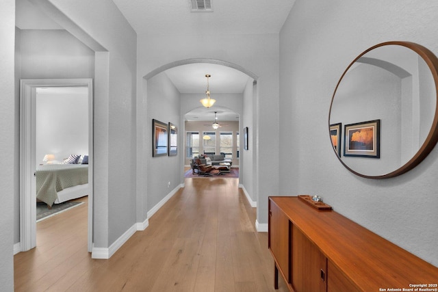 hall featuring light wood-type flooring