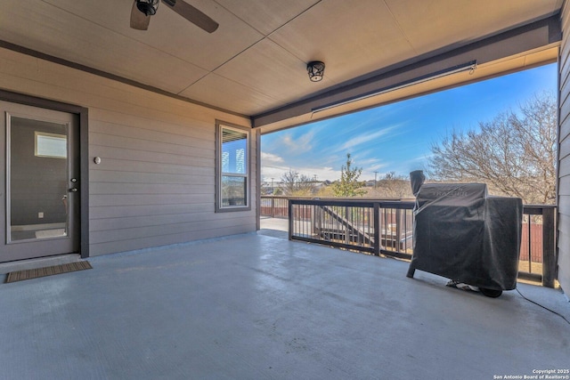 view of patio / terrace featuring a grill and ceiling fan