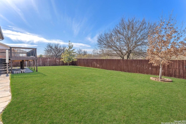 view of yard featuring a deck