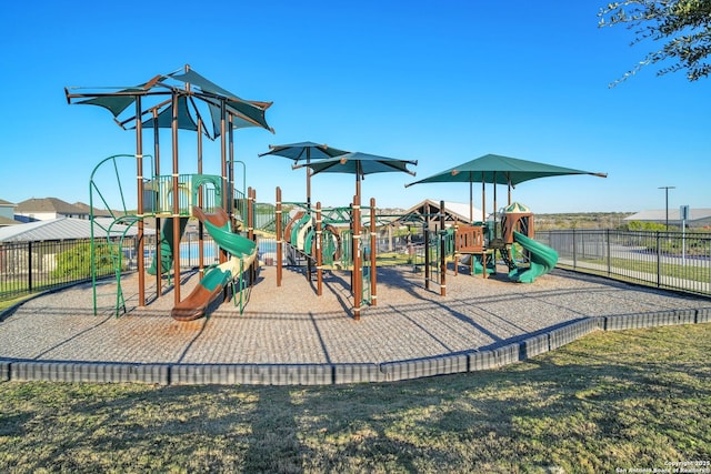 view of play area featuring a lawn