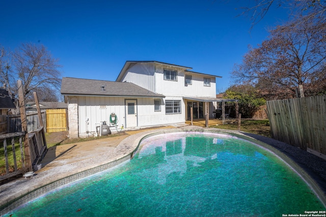 view of pool featuring a patio