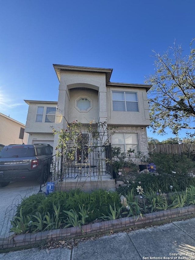 view of front of property featuring a garage