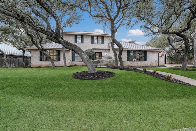 view of front of house with a front lawn