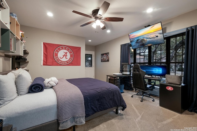 bedroom featuring ceiling fan and light colored carpet