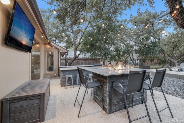 view of patio with an outdoor bar