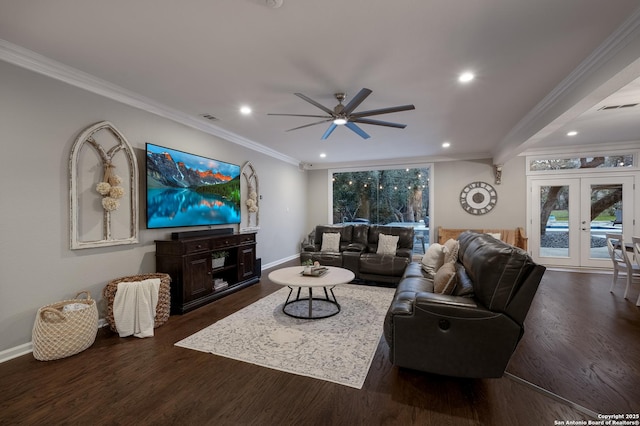 living room featuring ornamental molding, dark wood-type flooring, ceiling fan, and french doors