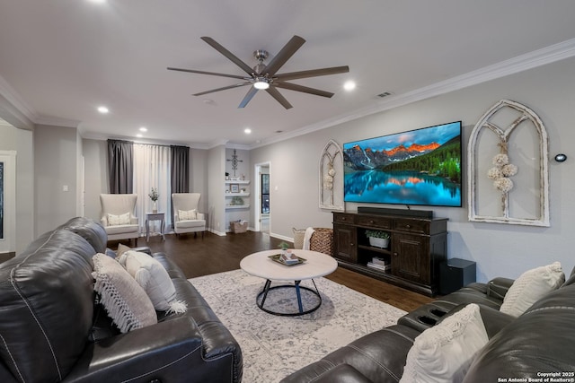 living room featuring crown molding, ceiling fan, and hardwood / wood-style floors