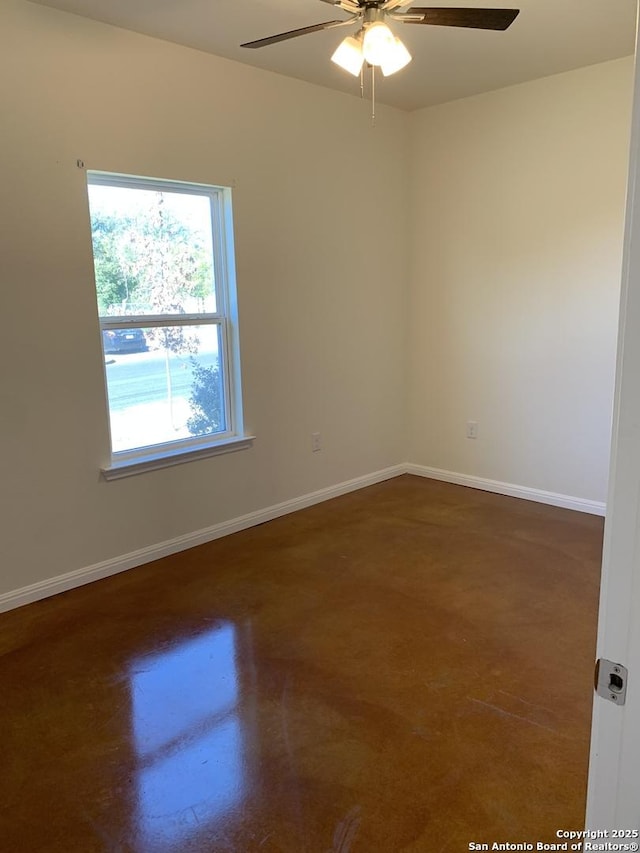 unfurnished room with ceiling fan