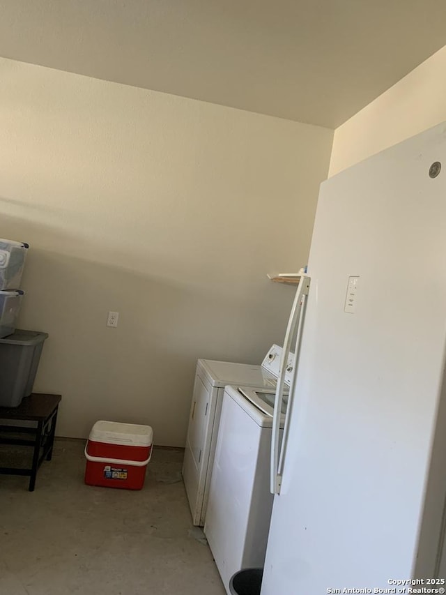 laundry area with independent washer and dryer