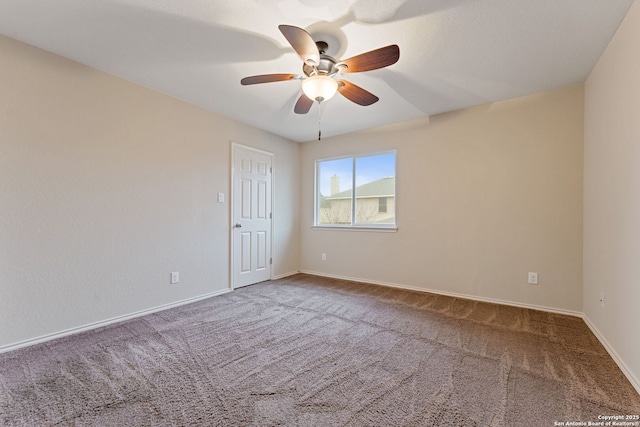 unfurnished room featuring carpet and ceiling fan