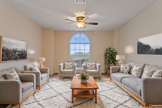 living room with ceiling fan