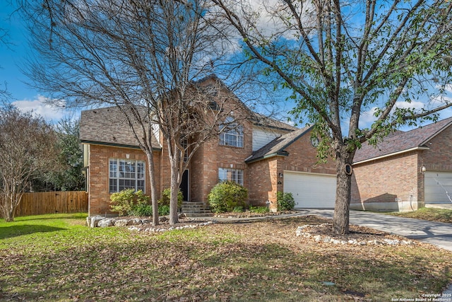 traditional home with driveway, roof with shingles, an attached garage, fence, and brick siding