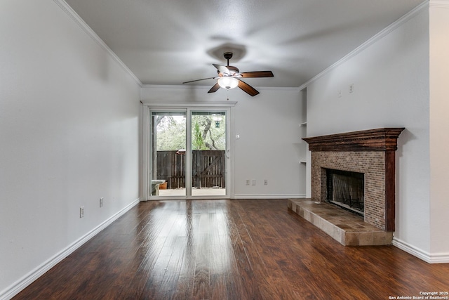 unfurnished living room with dark hardwood / wood-style flooring, crown molding, ceiling fan, and a tiled fireplace