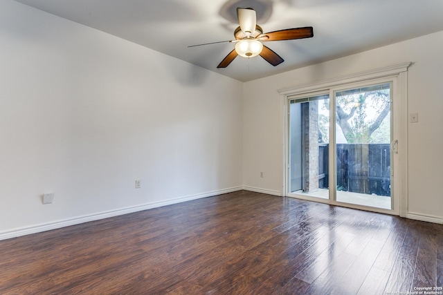 empty room featuring dark wood-type flooring and ceiling fan