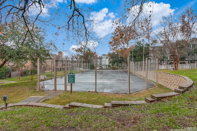 view of pool with a yard, basketball court, and tennis court