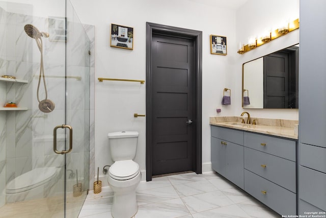 bathroom featuring vanity, toilet, and walk in shower