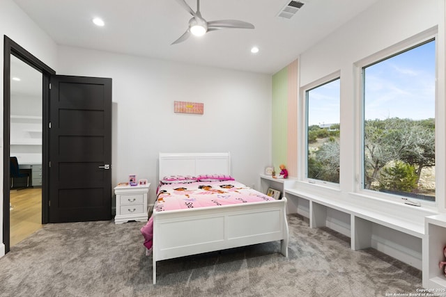 carpeted bedroom featuring ceiling fan