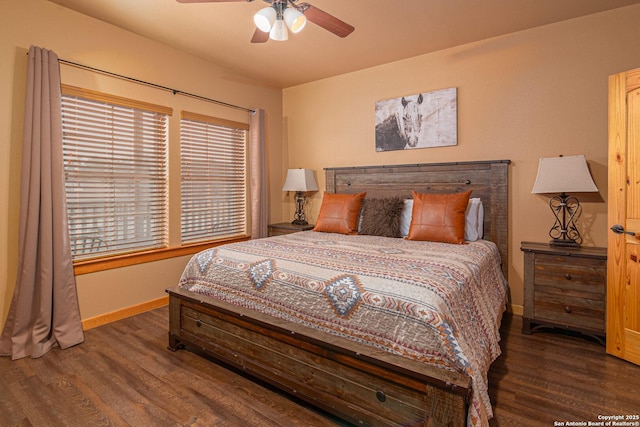 bedroom featuring dark wood-type flooring and ceiling fan