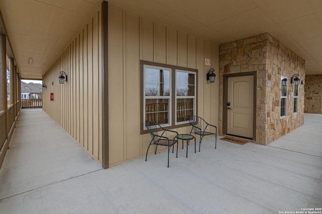 view of exterior entry featuring a porch