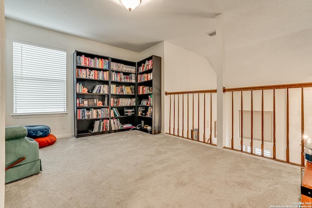 living area with carpet