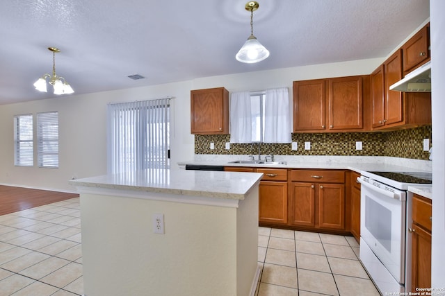 kitchen with pendant lighting, light tile patterned floors, sink, light stone counters, and white electric stove