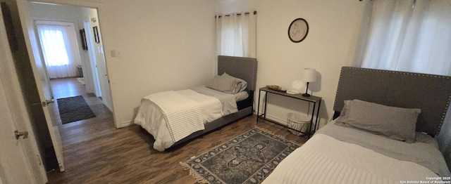 bedroom featuring dark hardwood / wood-style floors